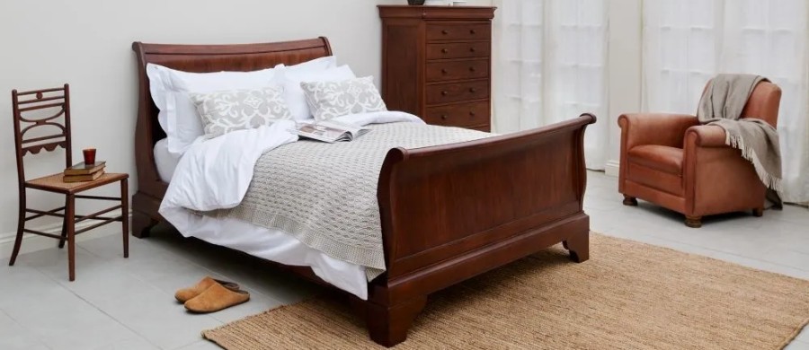 homepage image wooden sleigh bed